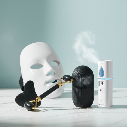 LED Face Mask, Nano Facial Steamer and Ice Roller Gua Sha Set arranged as a skincare bundle
